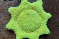 Back of Sunflower. Solid yellow color.