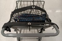Purse and All Safety Net attached to shopping cart to protect items in child carrier section of cart