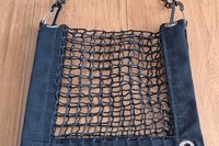 Purse and All Safety Net resembling a purse when folded in half and using included plastc chain as purse strap