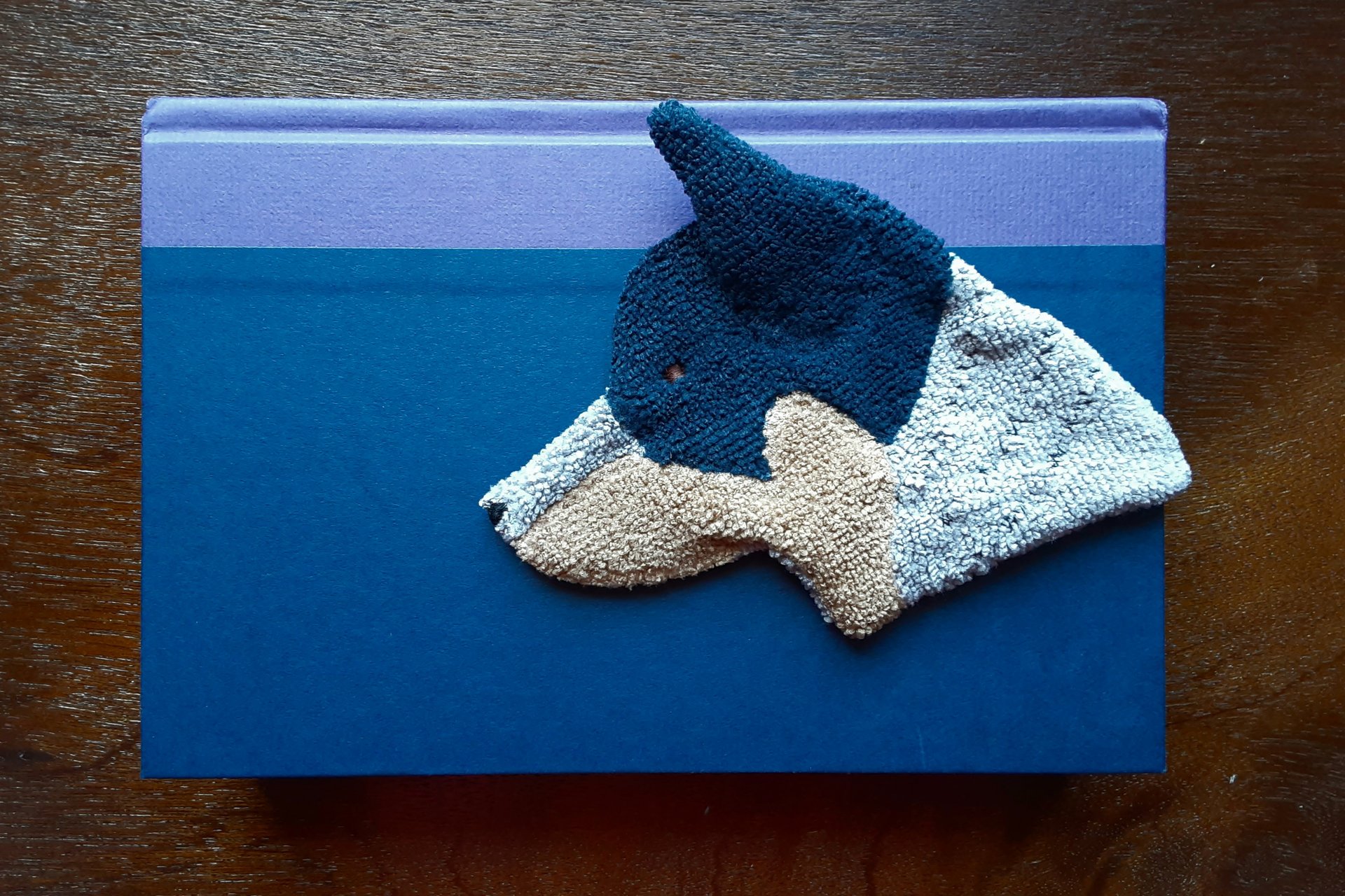 Australian Cattle Dog used as a bookmark.
