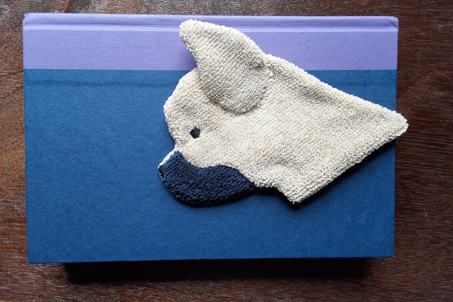 Frenchie used as a bookmark.