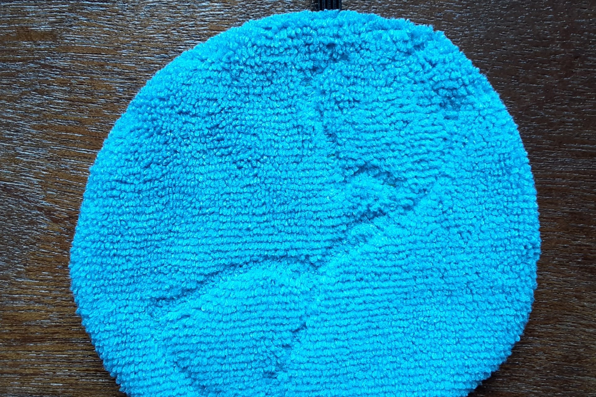 This is a view of the back side of Clean Earth. The back side is a solid blue