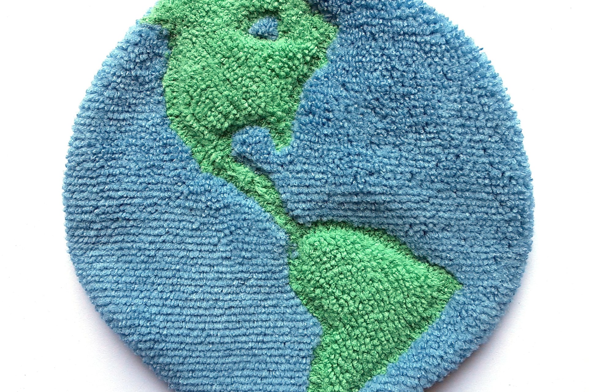 Soft, microfiber terry cloth towels  made in the shape of the Earth