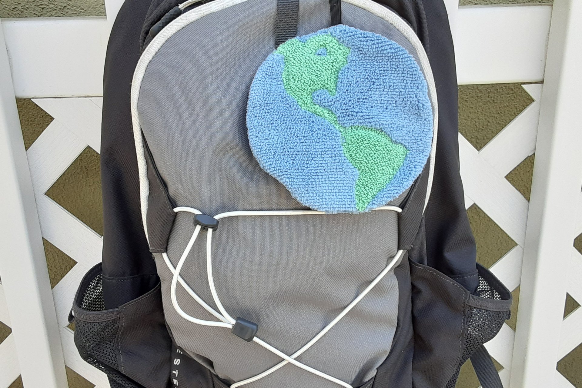 looped through a backpack or handbag so that it’s easy to find and use.