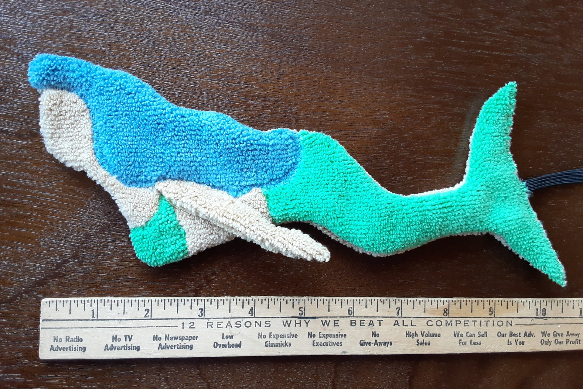 Tan Mermaid with blue hair