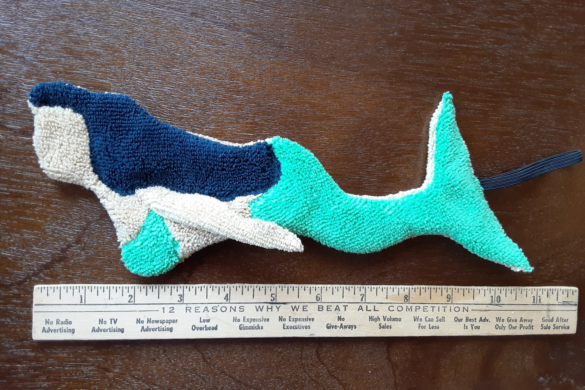 Tan Mermaid with black hair
