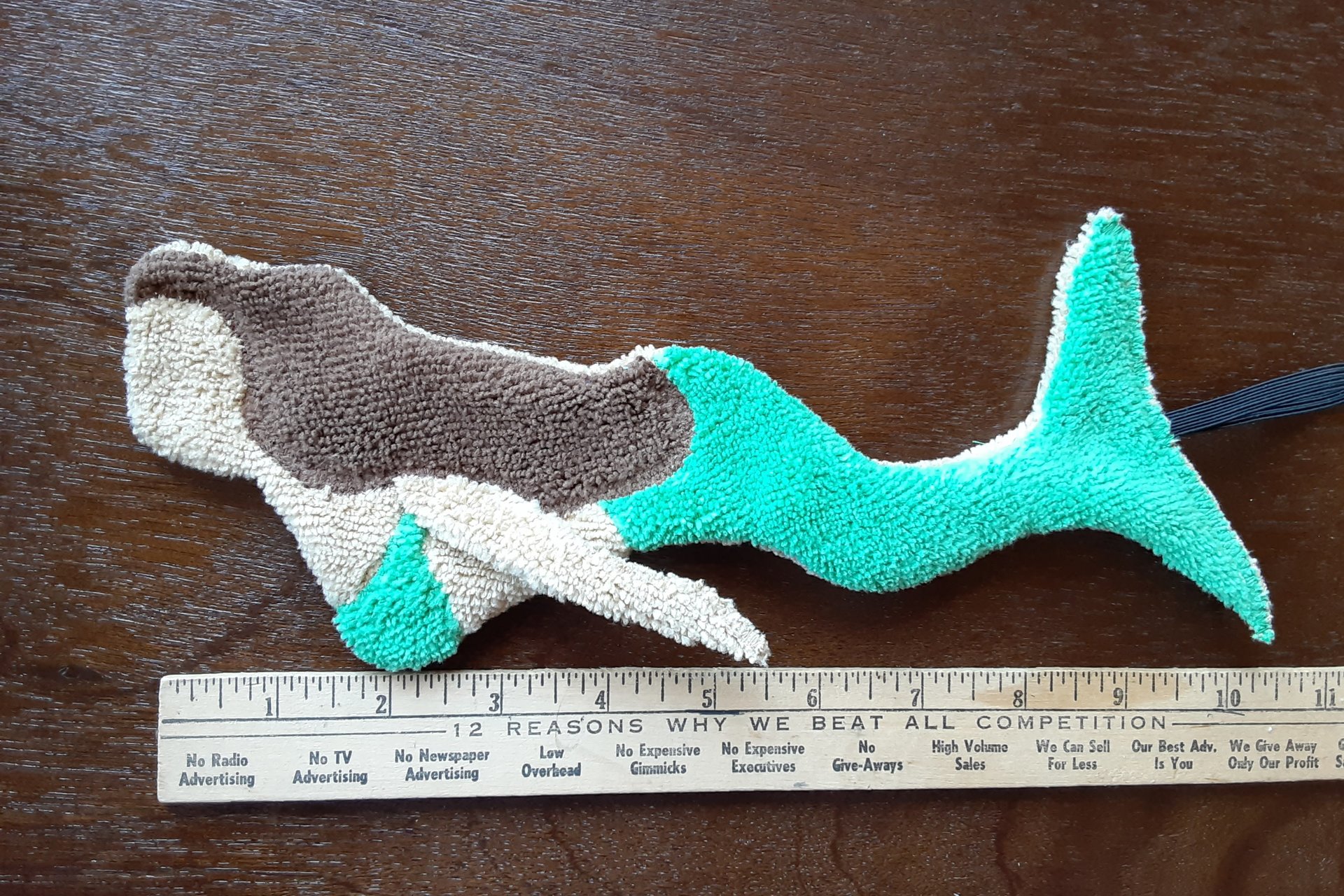 Tan Mermaid with brown hair