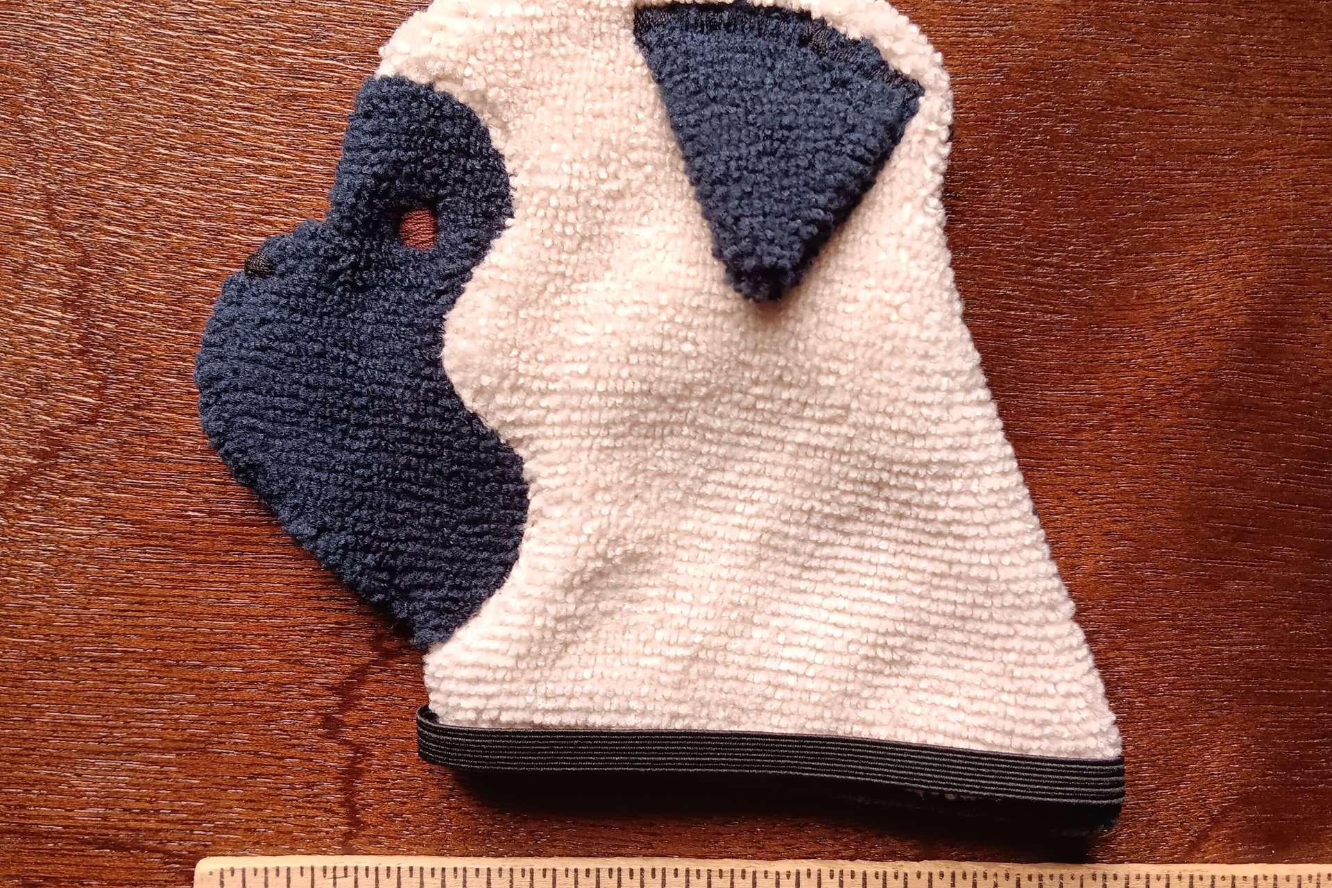 Smudge Dog with ruler to show size.