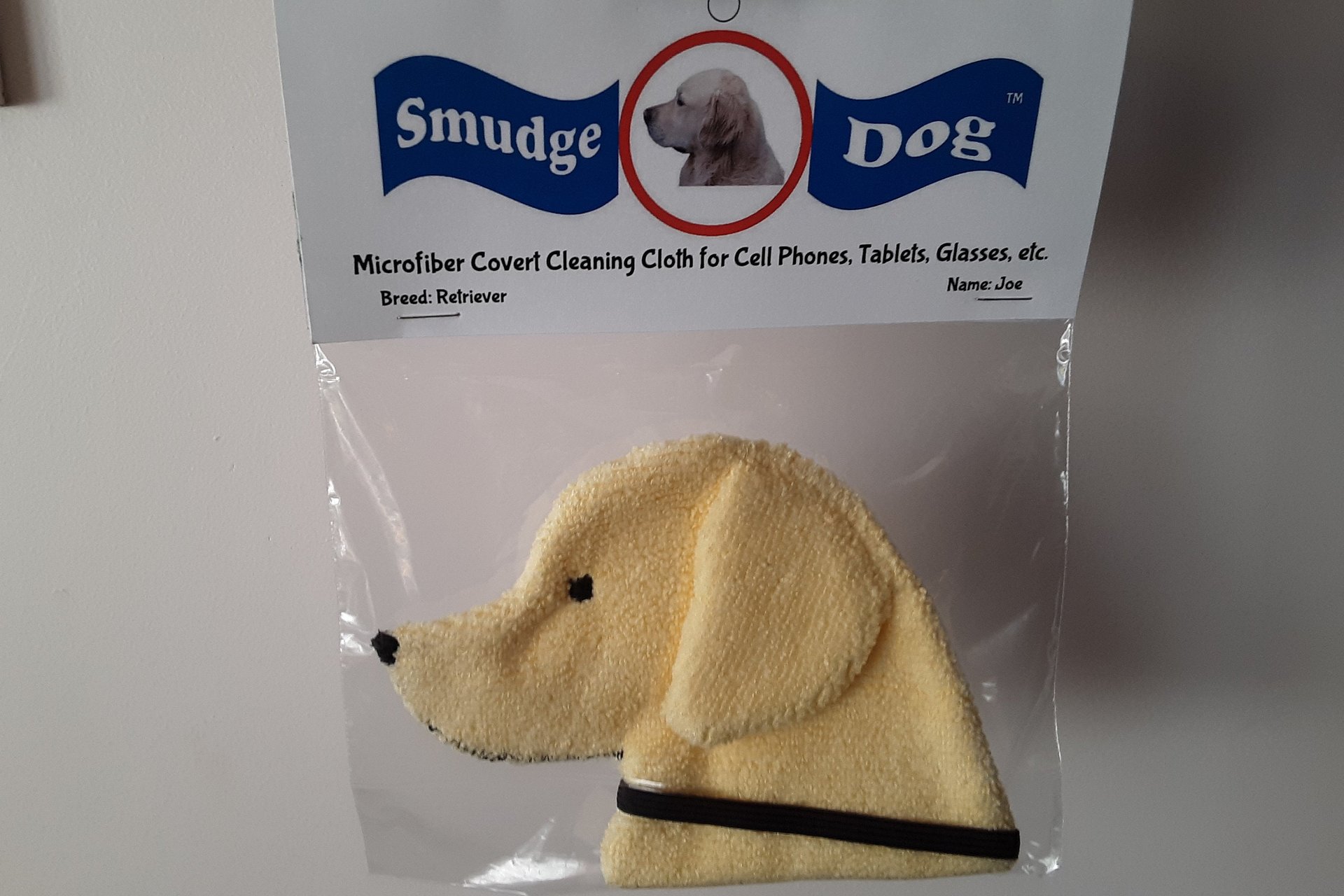 Example of Smudge Dog Packaging. Packaged in zip top bag with hang tag with logo
