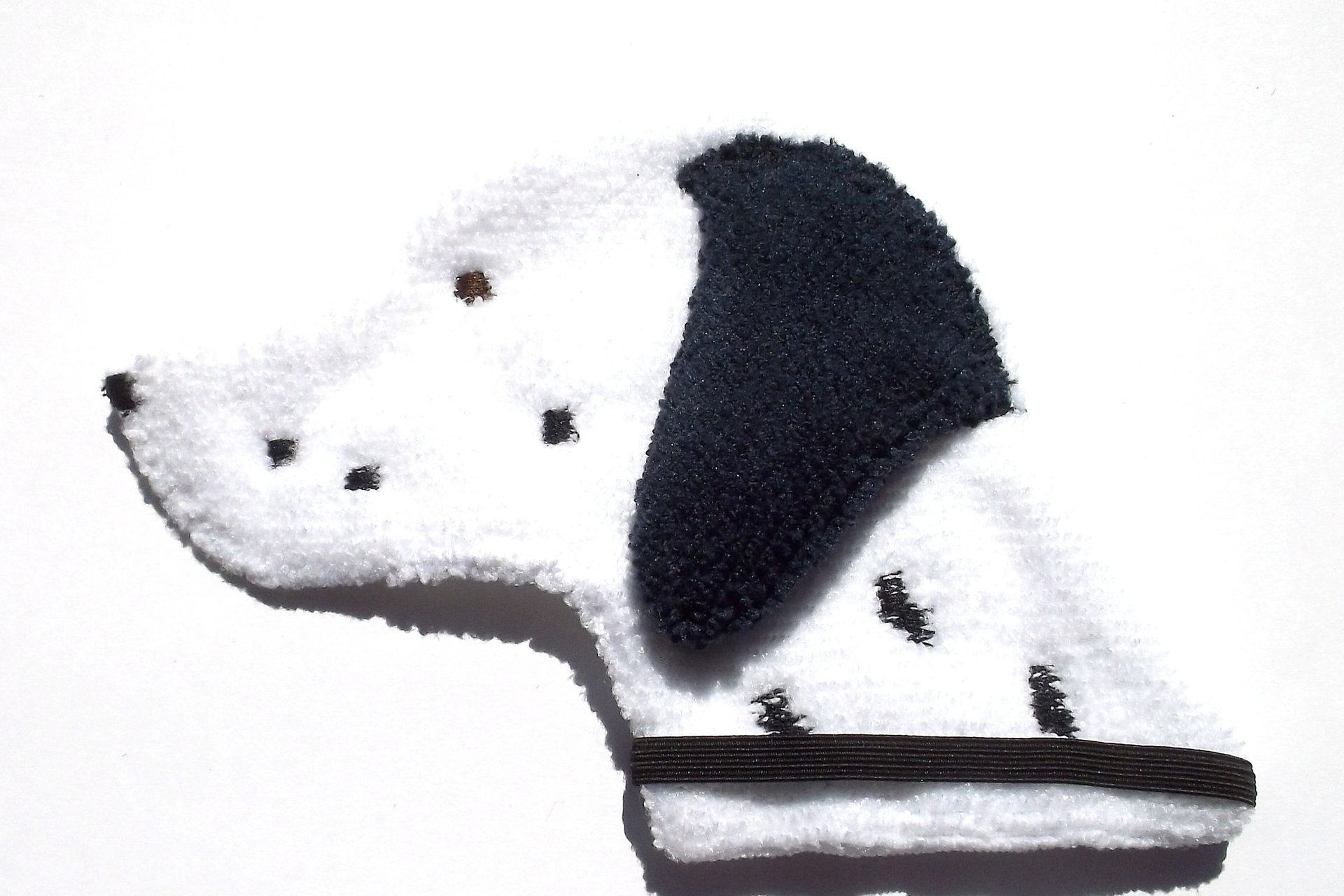 Soft, microfiber terry cloth towels cut, sewn, and made in the shape of a dog