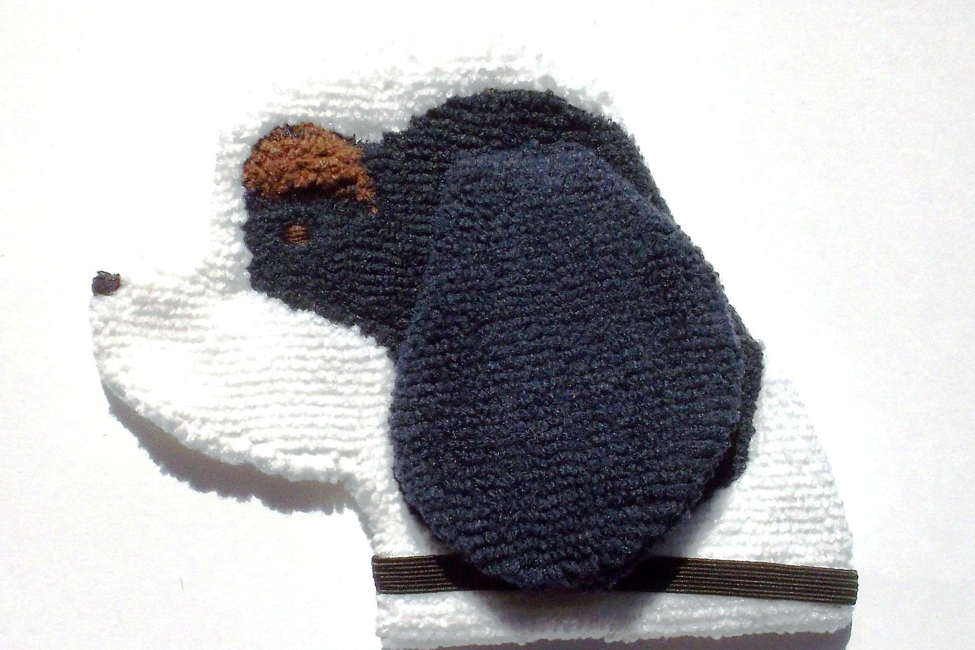 Soft, microfiber terry cloth towels cut, sewn, and made in the shape of a dog