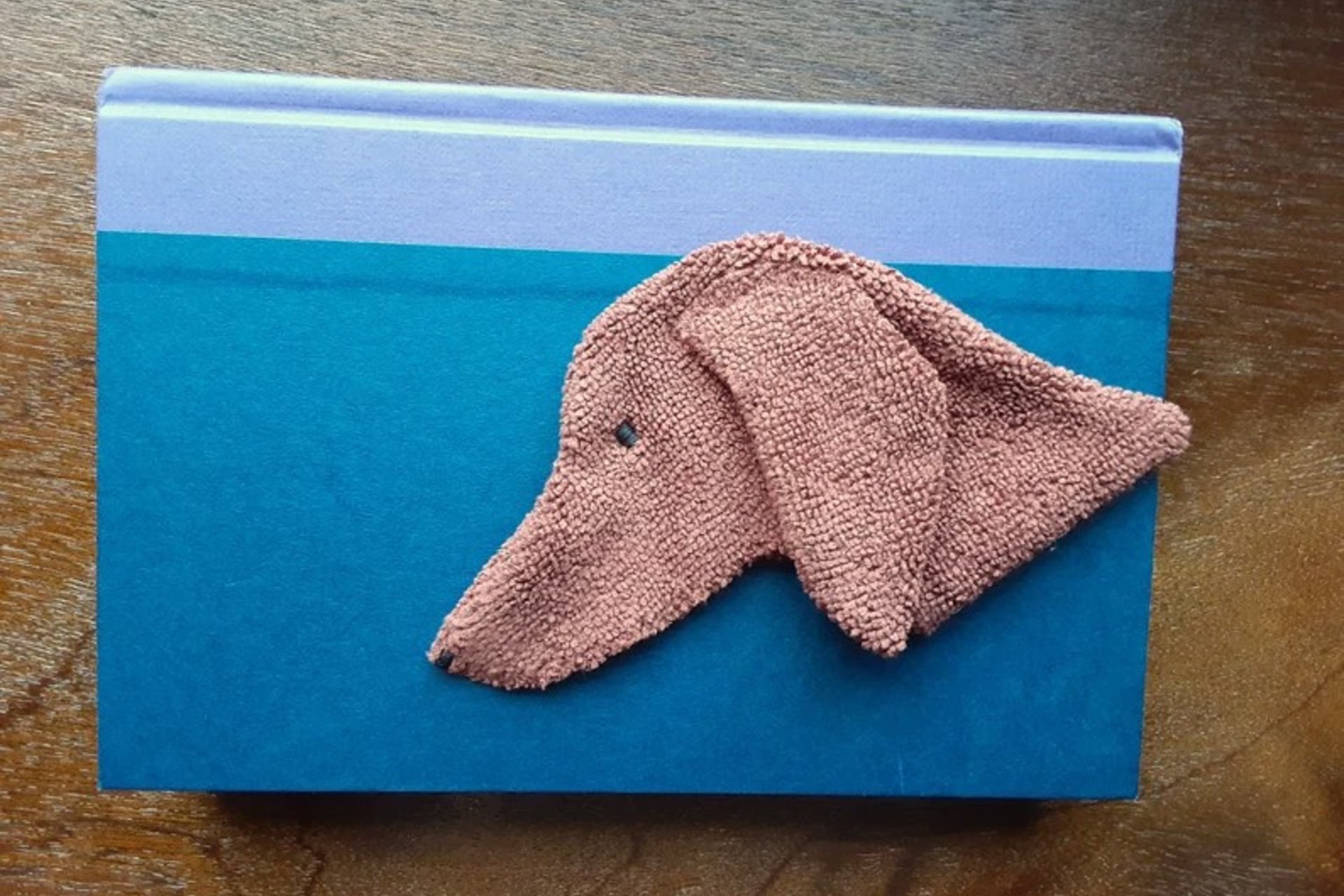 Smudge Dog used as a bookmark.