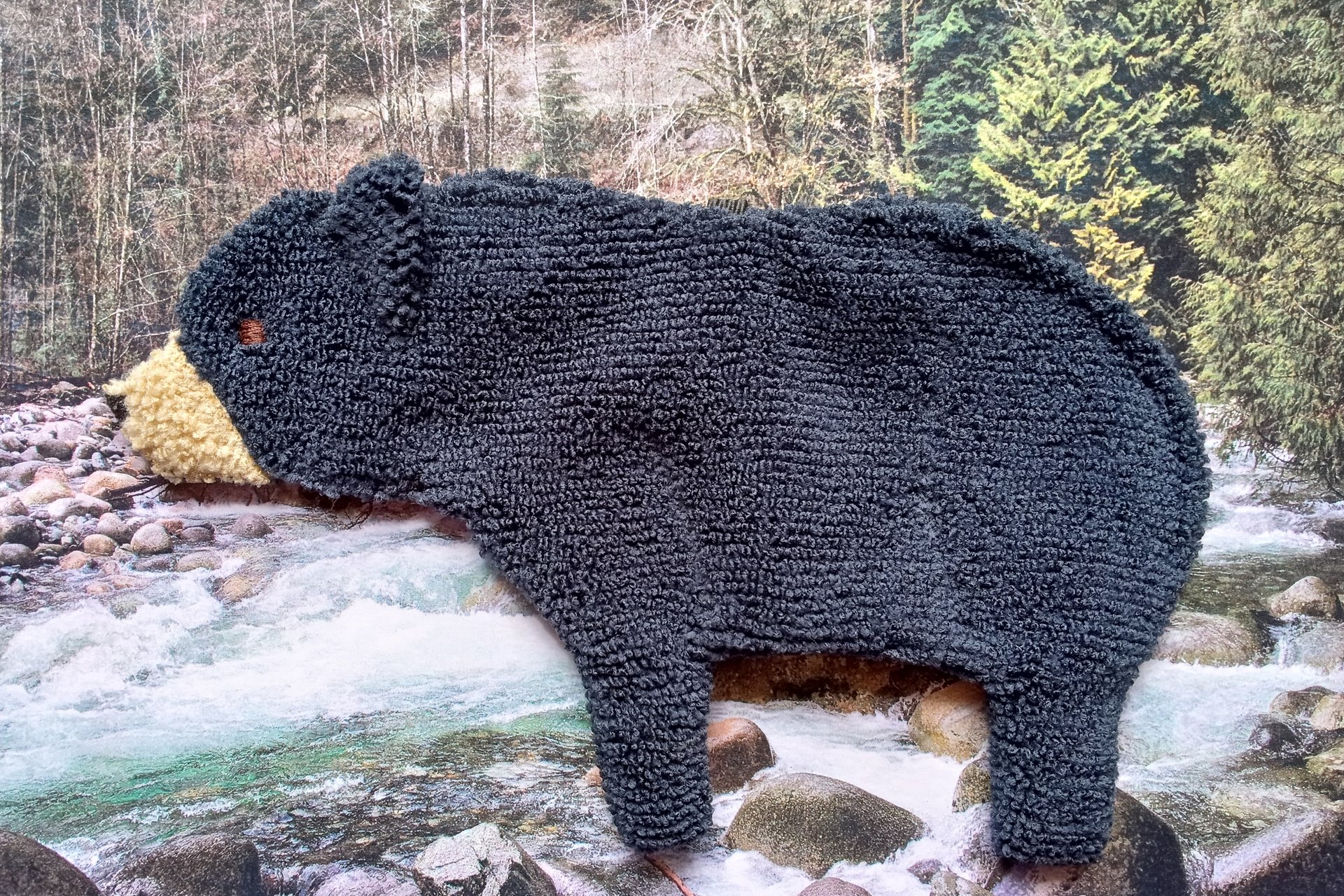 Soft, microfiber terry cloth towels  made in the shape of a Black Bear.