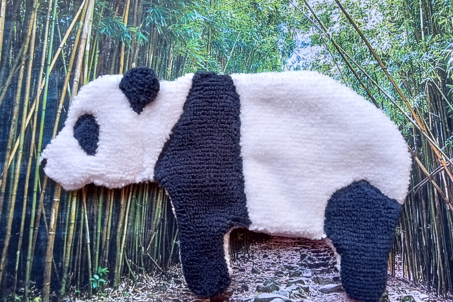 Soft, microfiber terry cloth towels  made in the shape of a Panda.