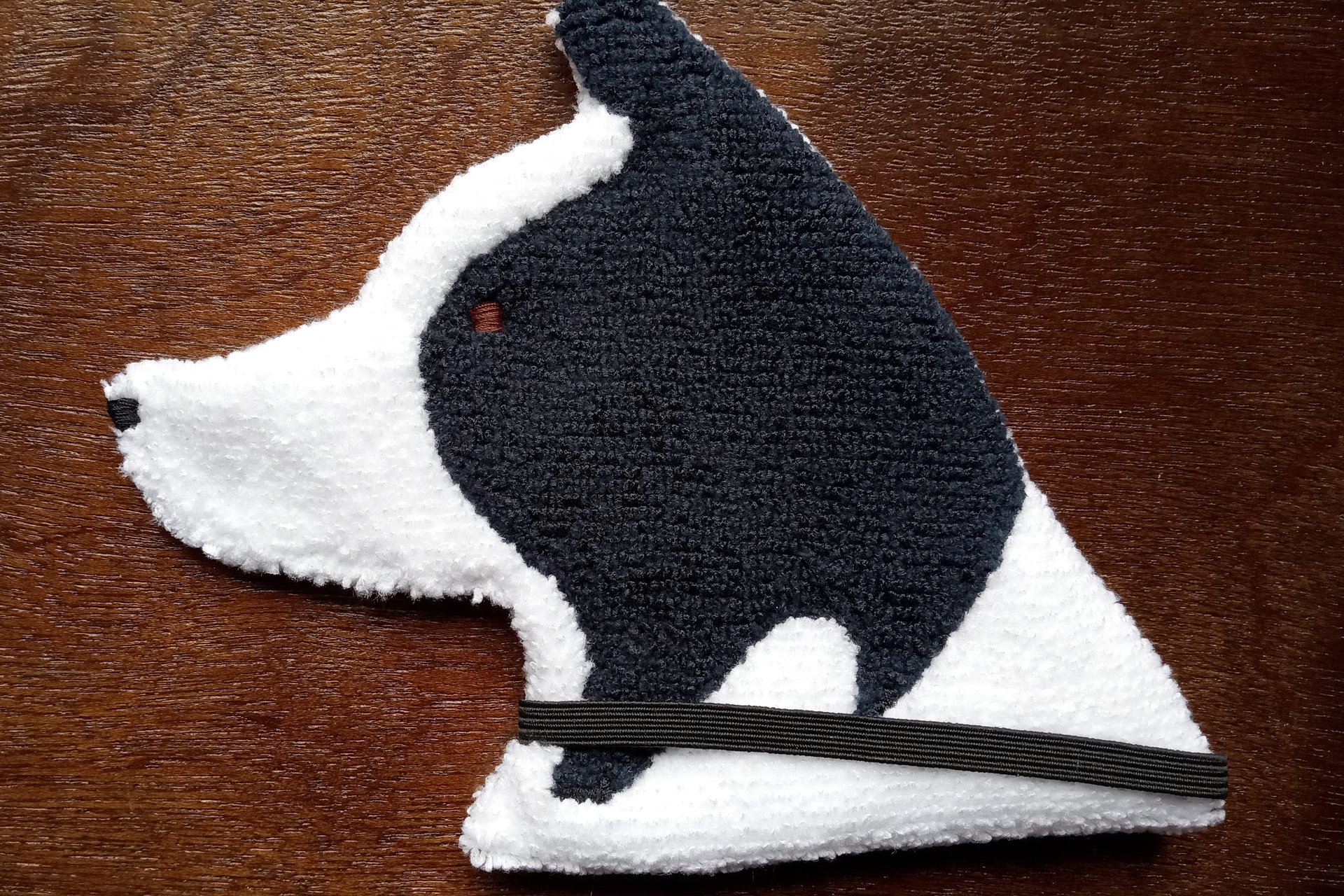 Soft, microfiber terry cloth towels cut, sewn, and made in the shape of a dog
