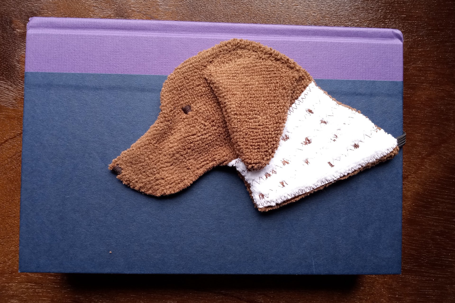 Smudge Dog being used as a bookmark