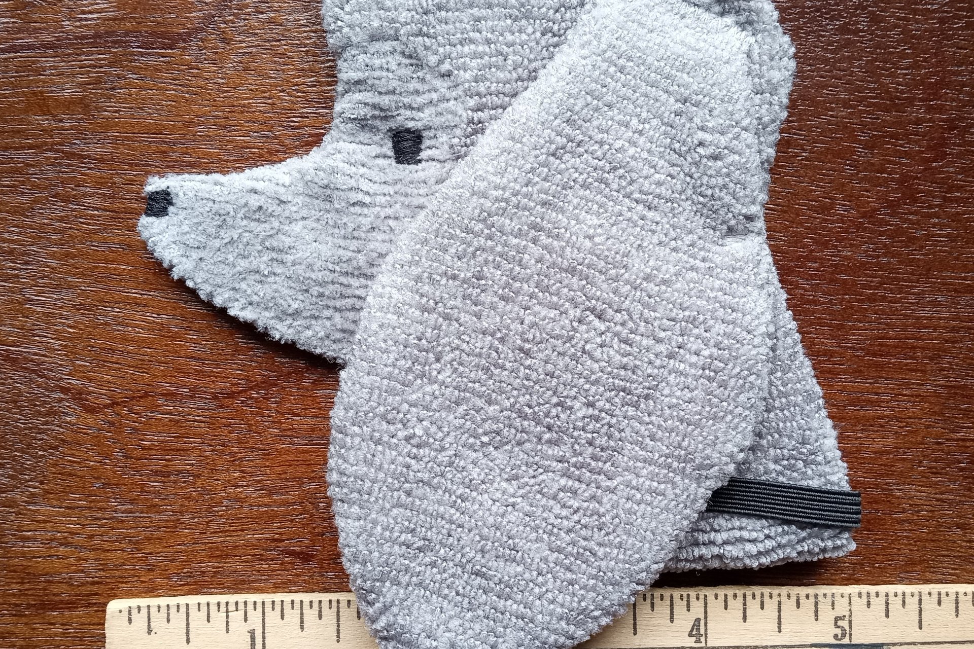 Smudge Dog with ruler to show size.