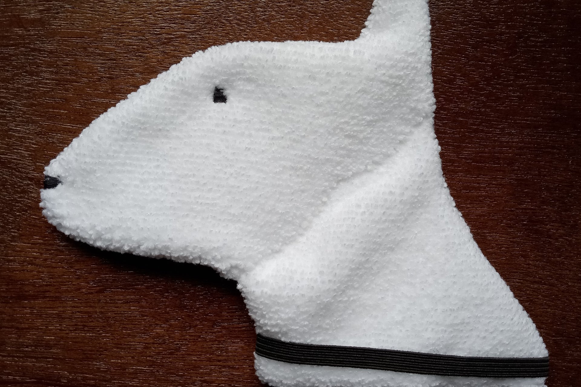 Soft, microfiber terry cloth towels cut, sewn, and made in the shape of a dog