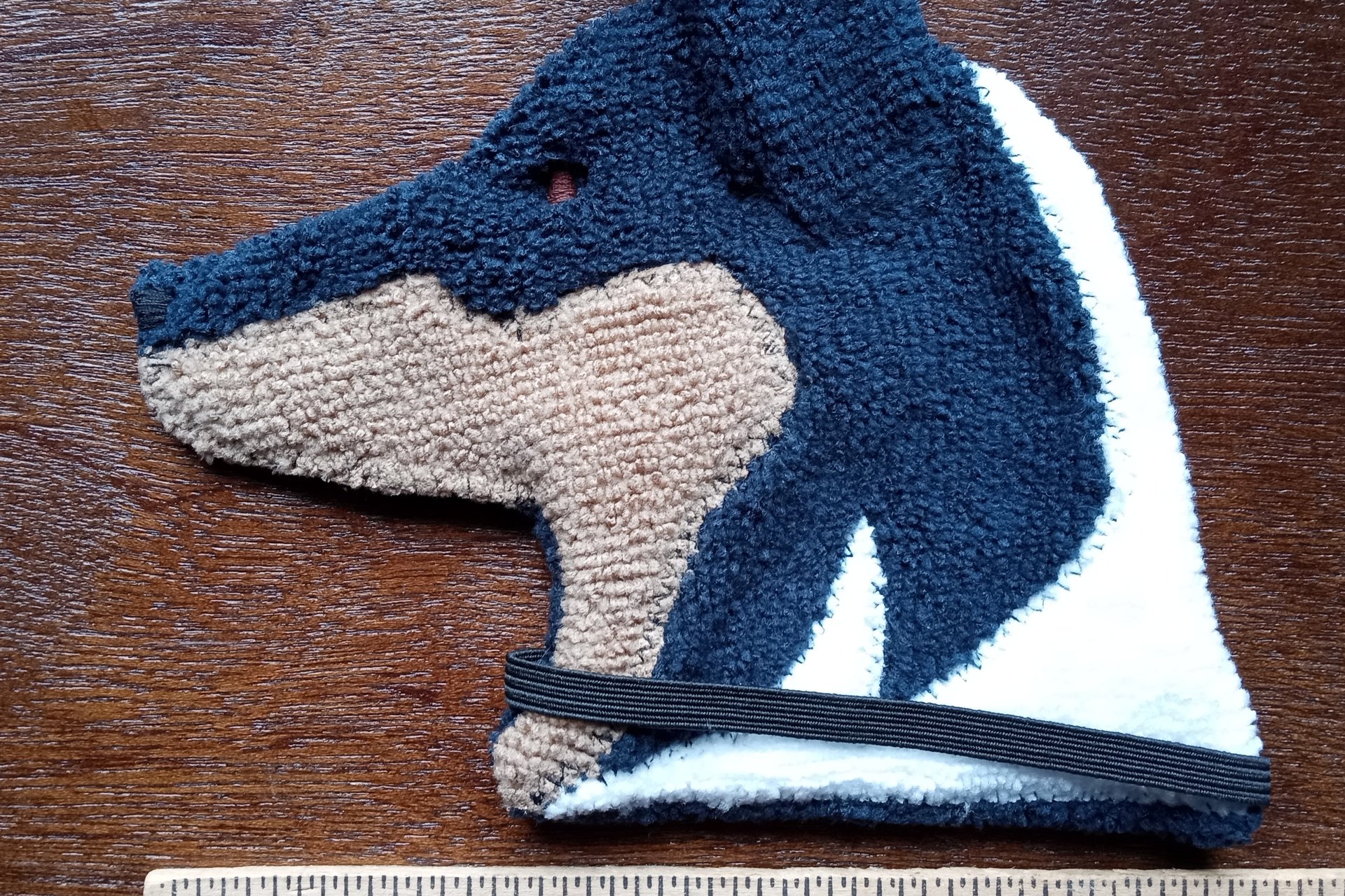 Smudge Dog with ruler to show size.