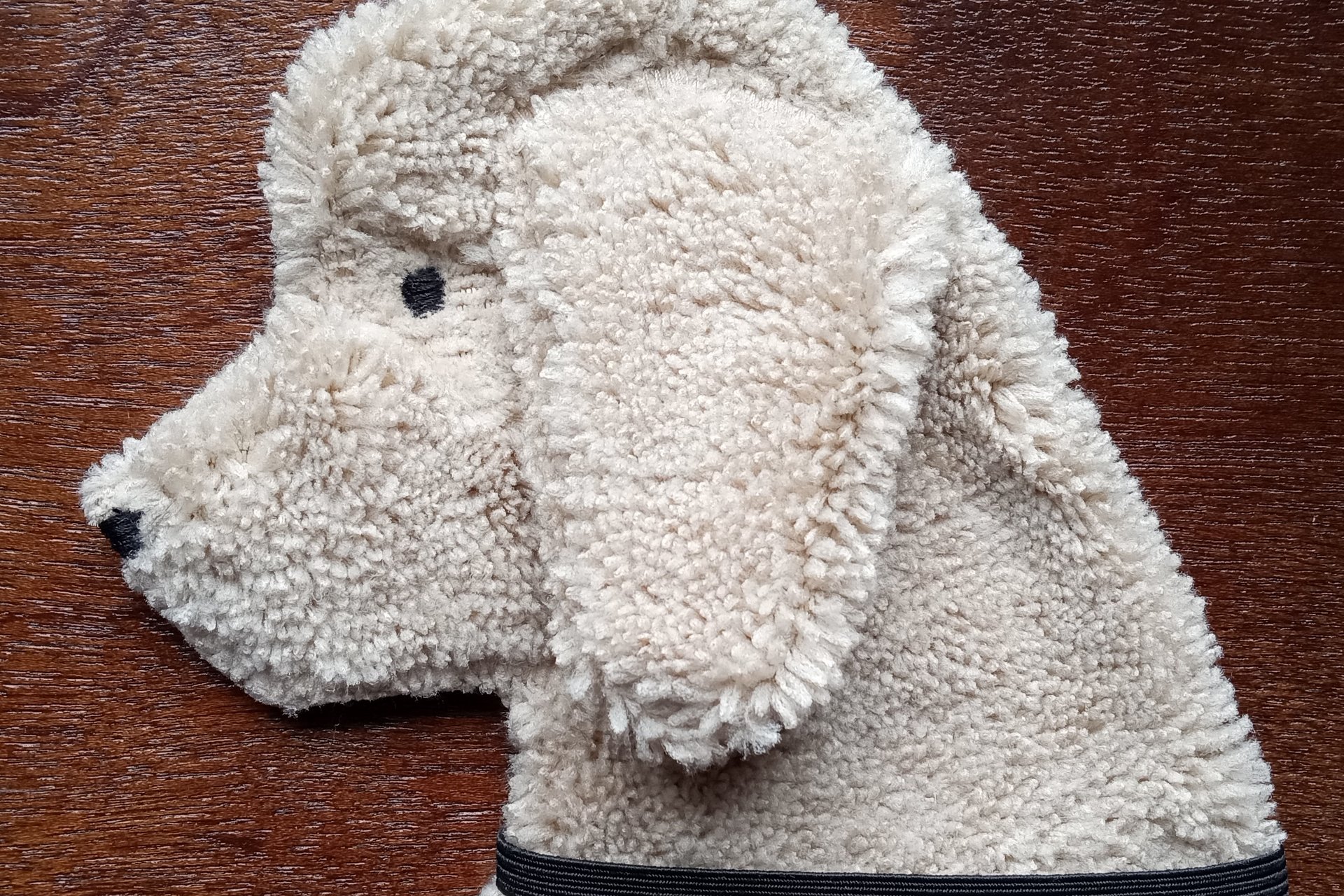 Soft, microfiber terry cloth towels cut, sewn, and made in the shape of a dog