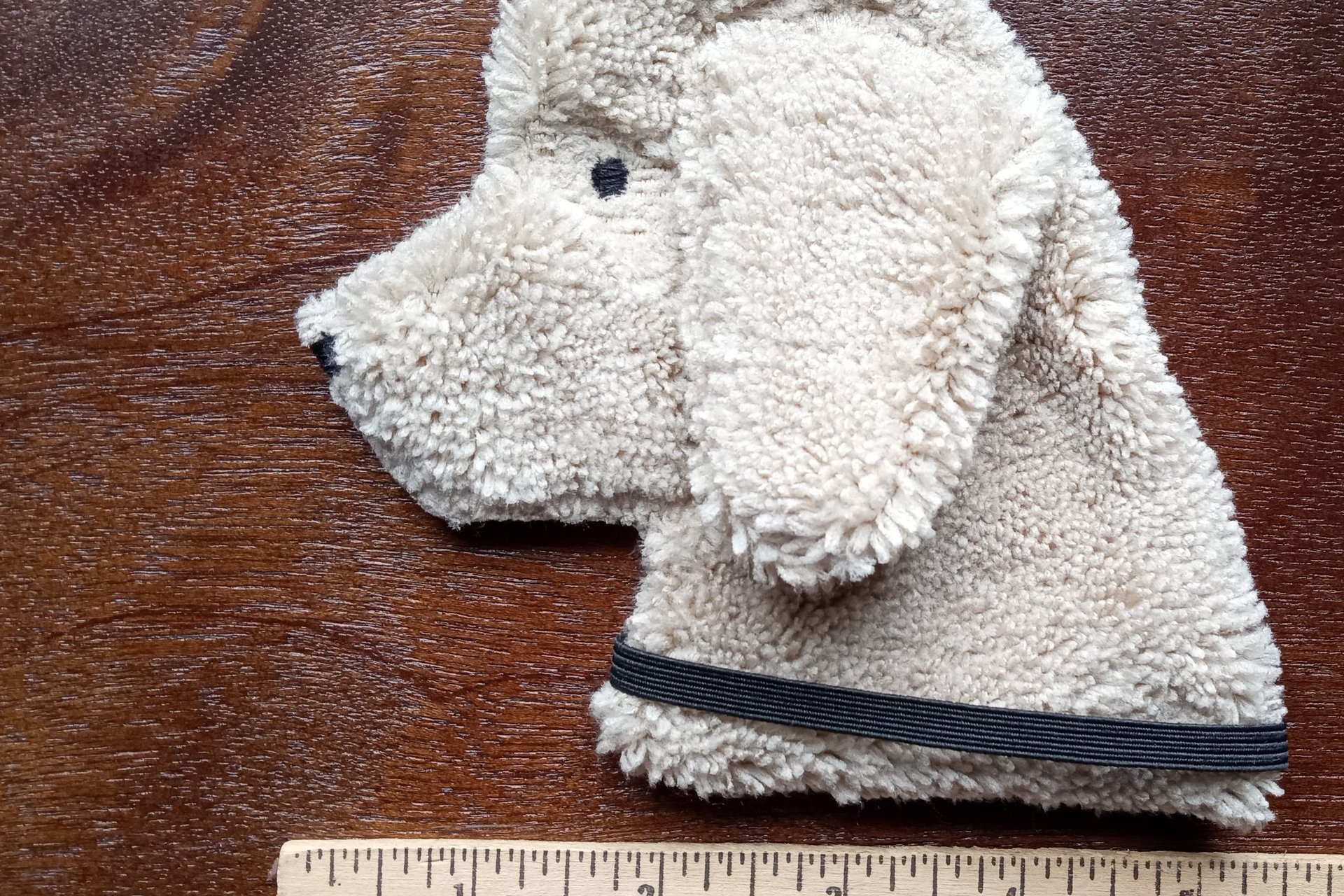Smudge Dog with ruler to show size.