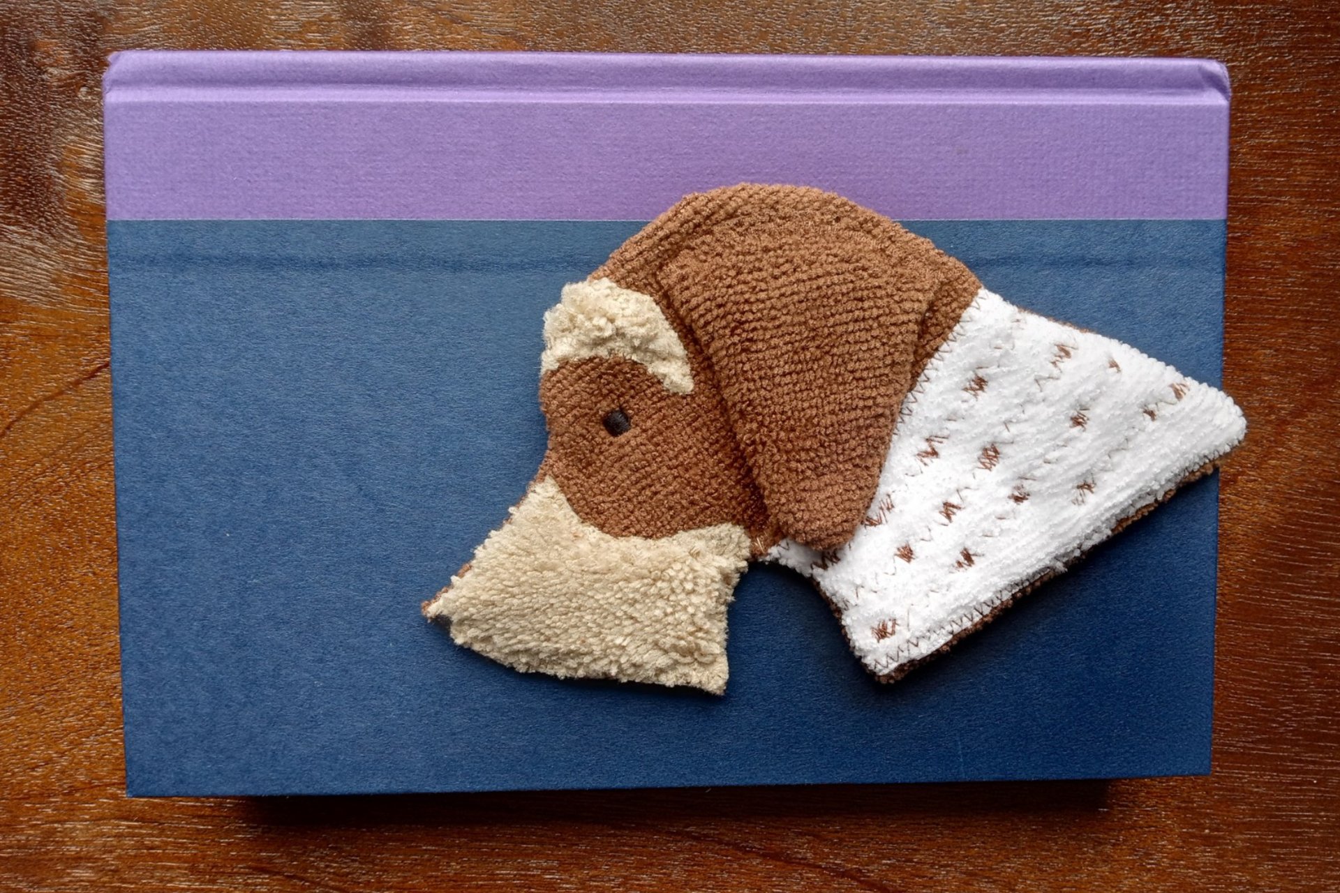 Smudge Dog being used as a bookmark