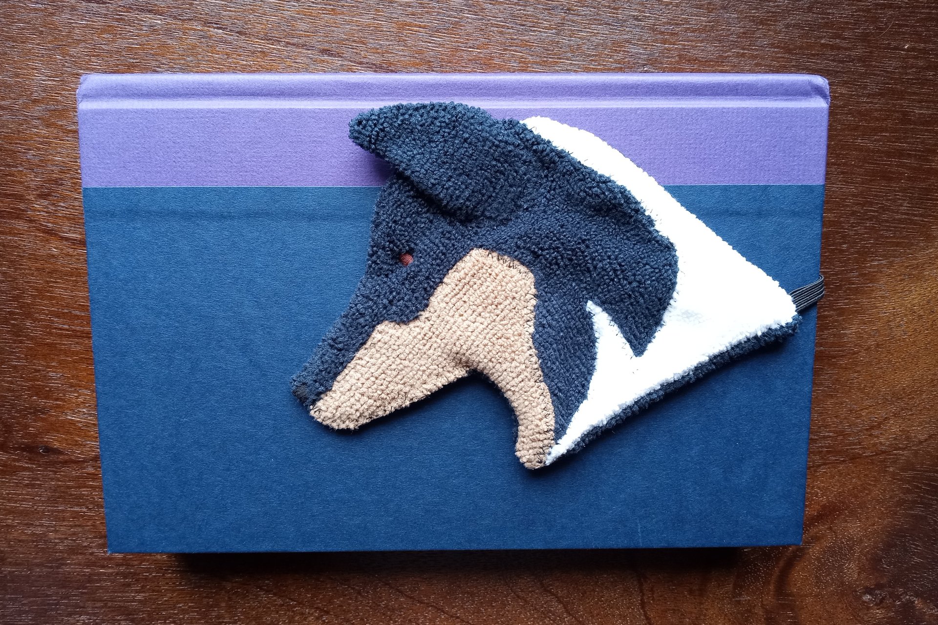 Smudge Dog used as bookmark.