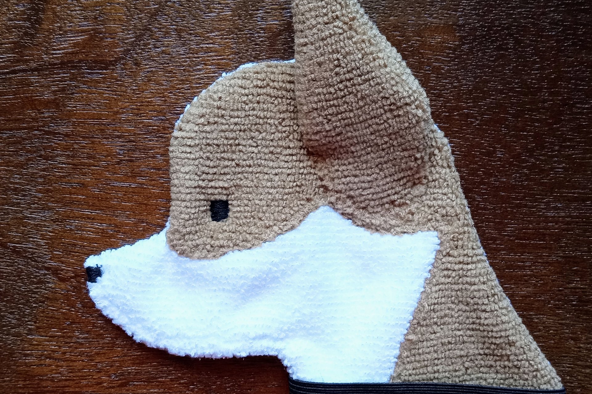 Soft, microfiber terry cloth towels cut, sewn, and made in the shape of a dog