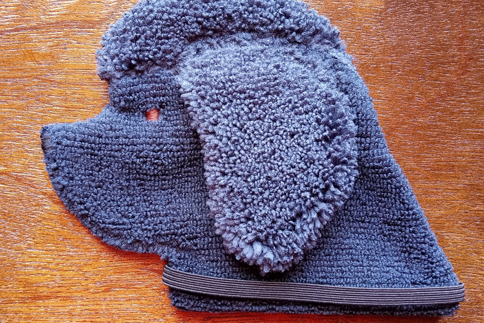 Soft, microfiber terry cloth towels cut, sewn, and made in the shape of a dog