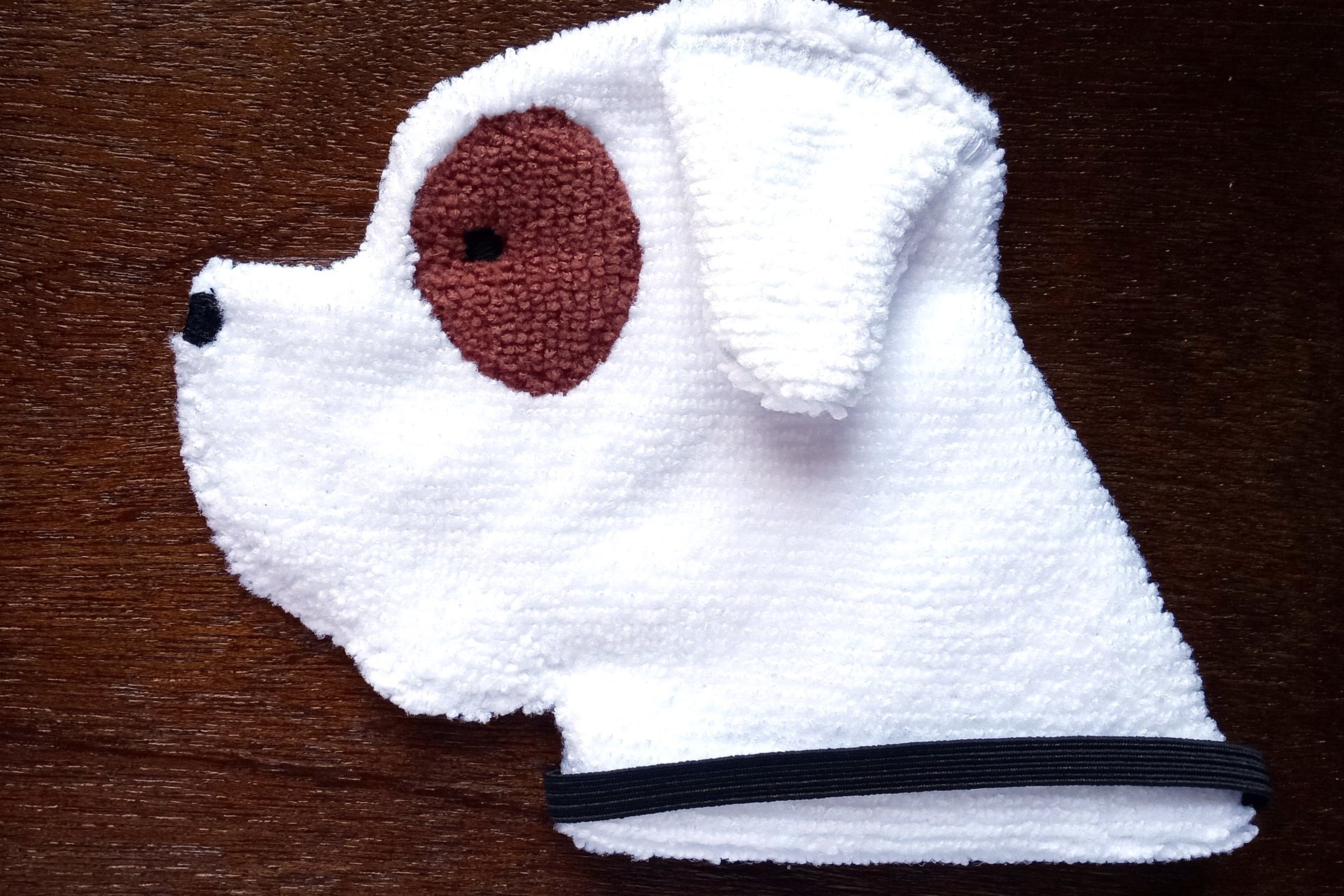 Soft, microfiber terry cloth towels cut, sewn, and made in the shape of a dog
