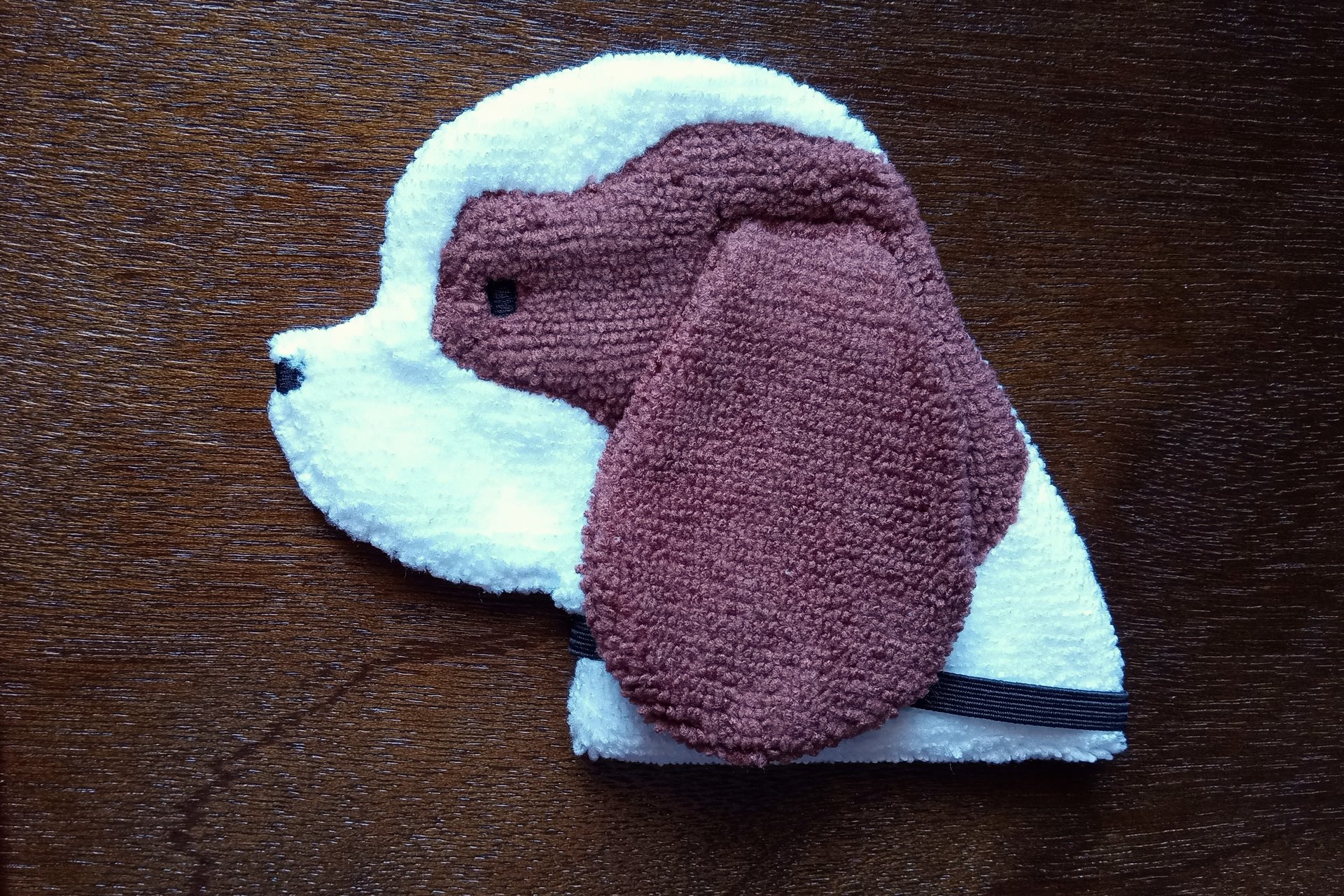 Soft, microfiber terry cloth towels cut, sewn, and made in the shape of a dog
