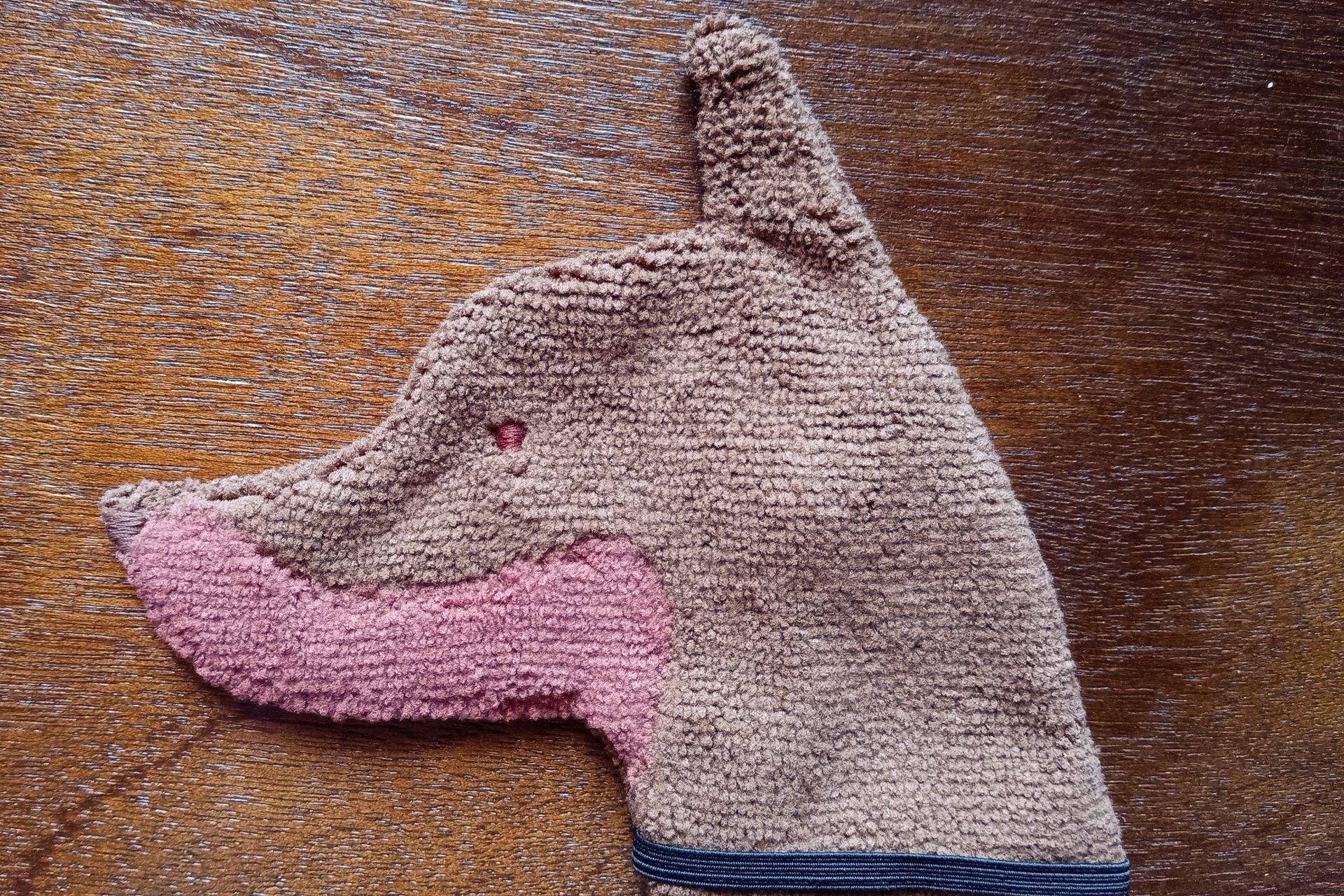 Soft, microfiber terry cloth towels cut, sewn, and made in the shape of a dog