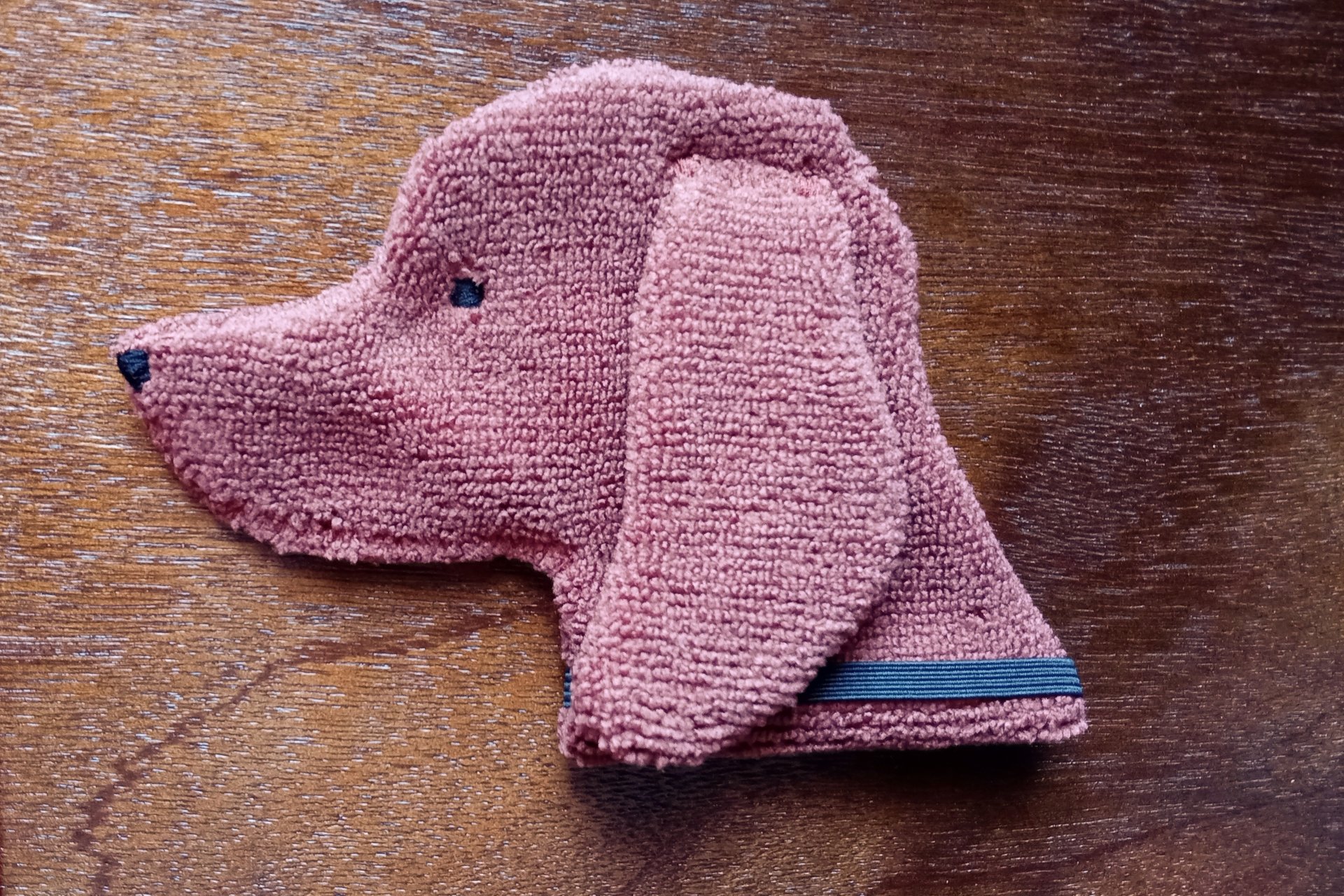 Soft, microfiber terry cloth towels cut, sewn, and made in the shape of a dog