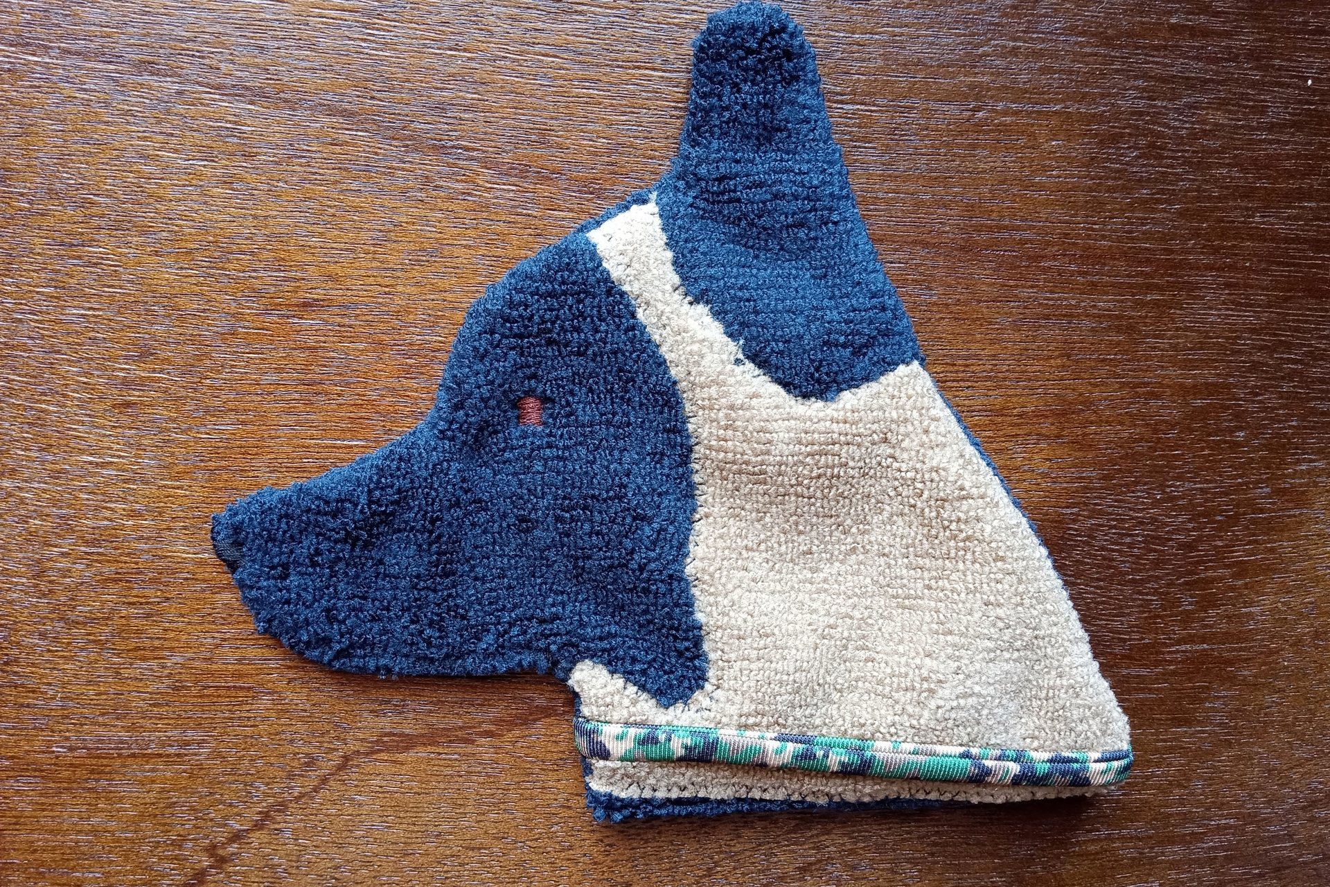 Soft, microfiber terry cloth towels cut, sewn, and made in the shape of a dog