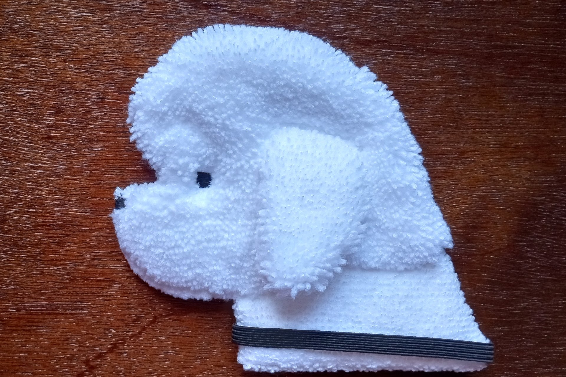 Soft, microfiber terry cloth towels cut, sewn, and made in the shape of a dog