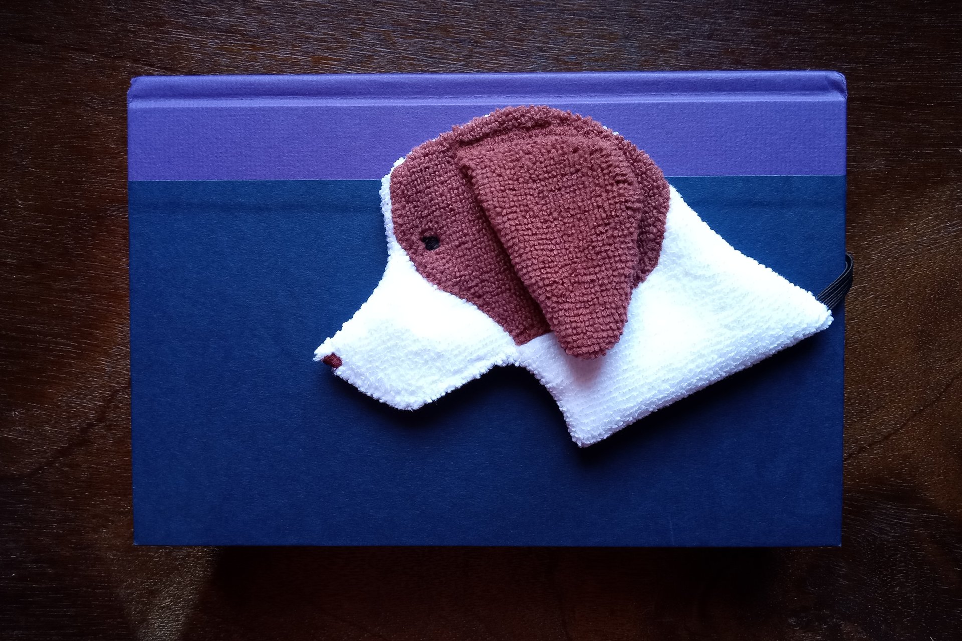 Smudge Dog used as a bookmark.