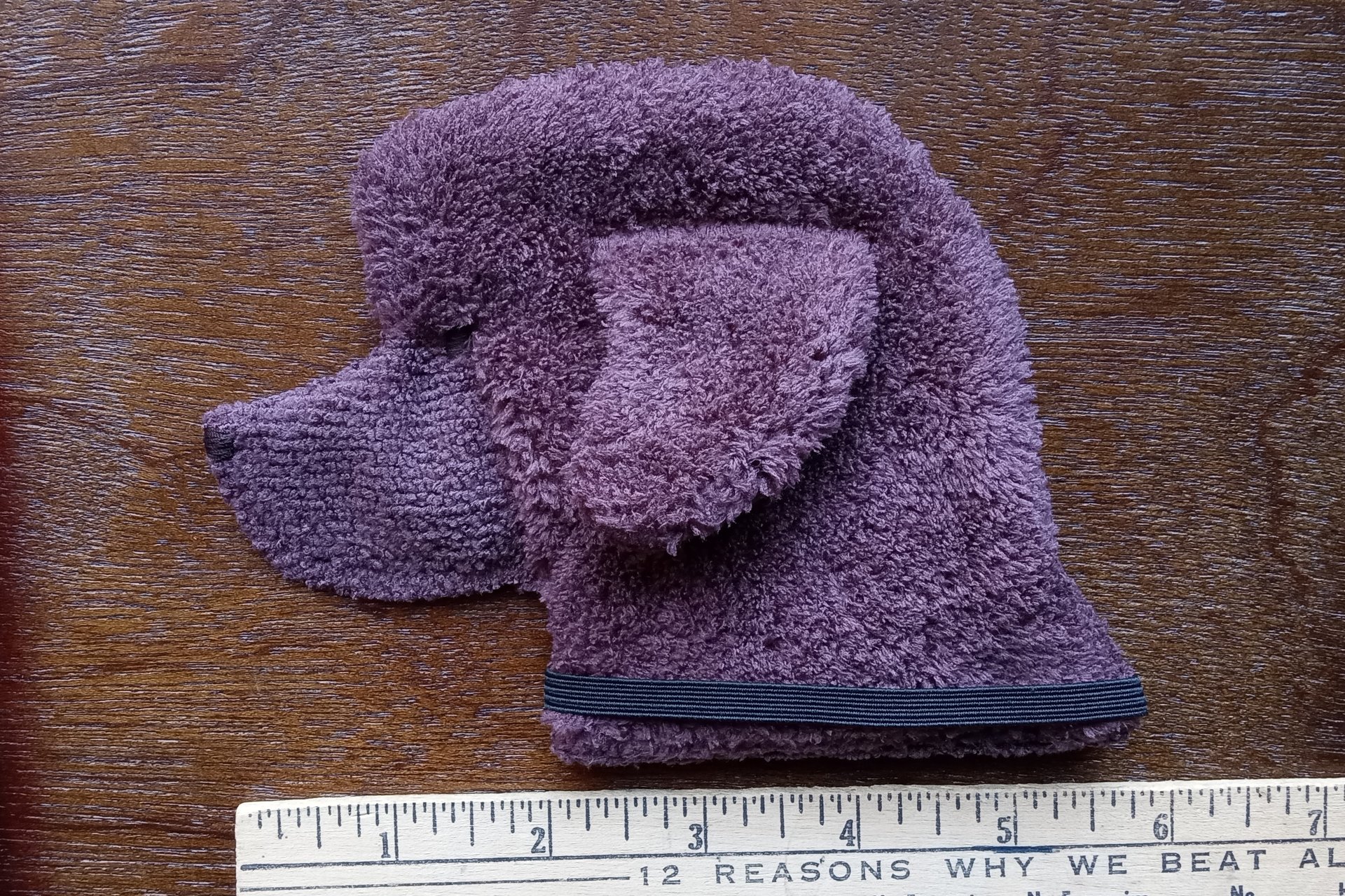 Smudge Dog shown with ruler to show size.