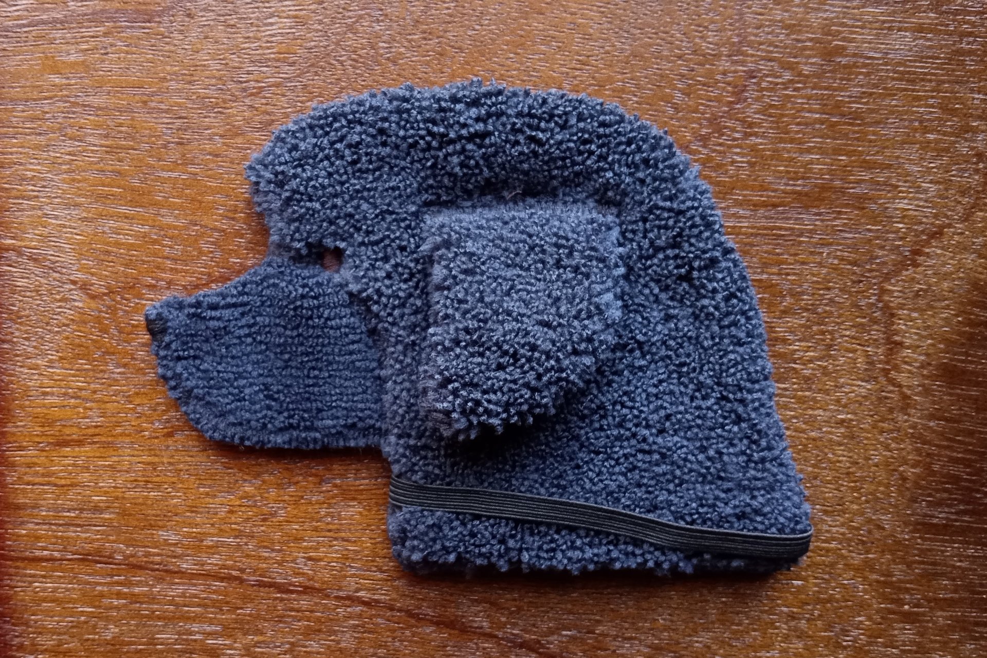 Soft, microfiber terry cloth towels cut, sewn, and made in the shape of a dog