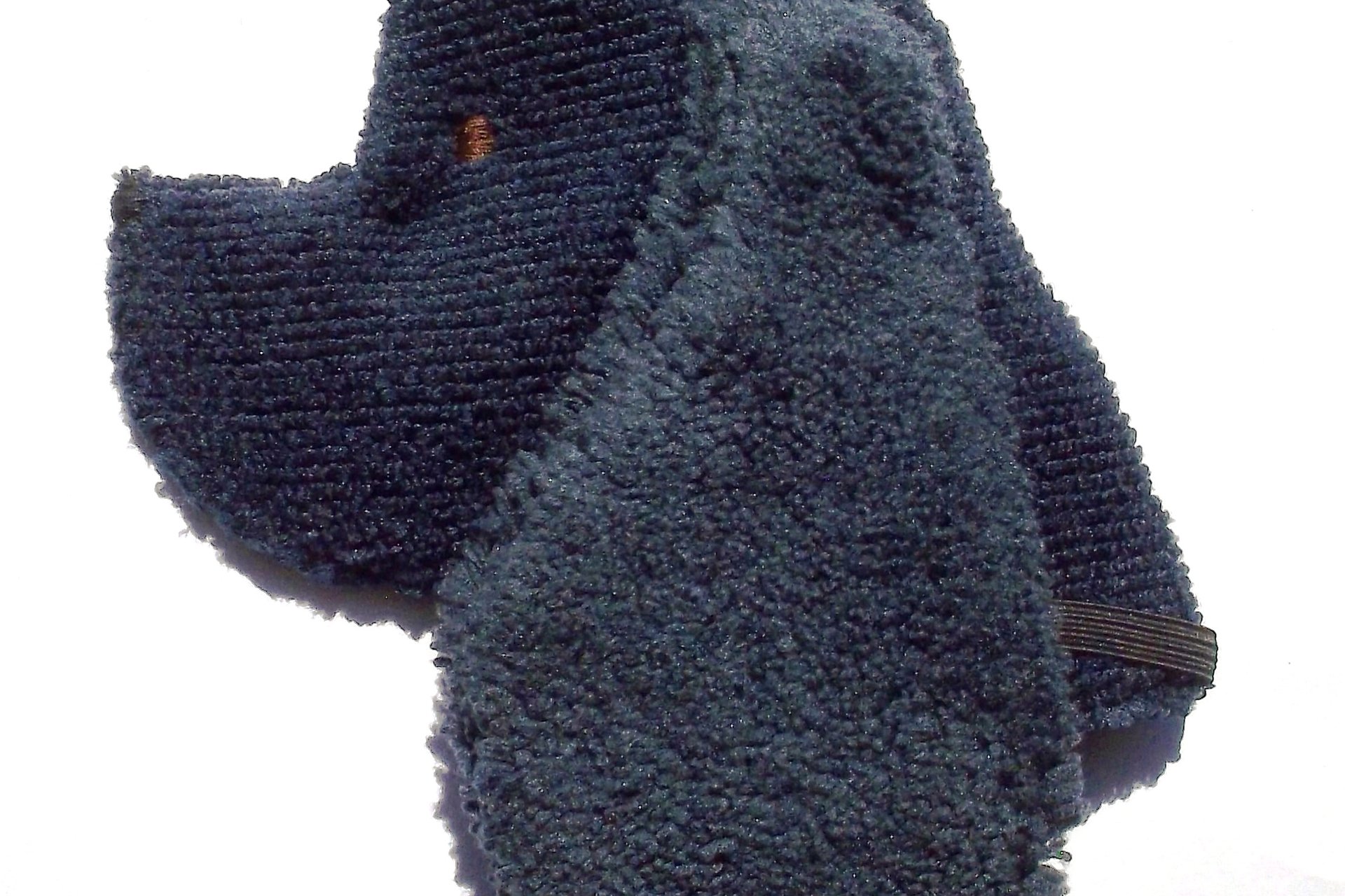 Soft, microfiber terry cloth towels cut, sewn, and made in the shape of a dog