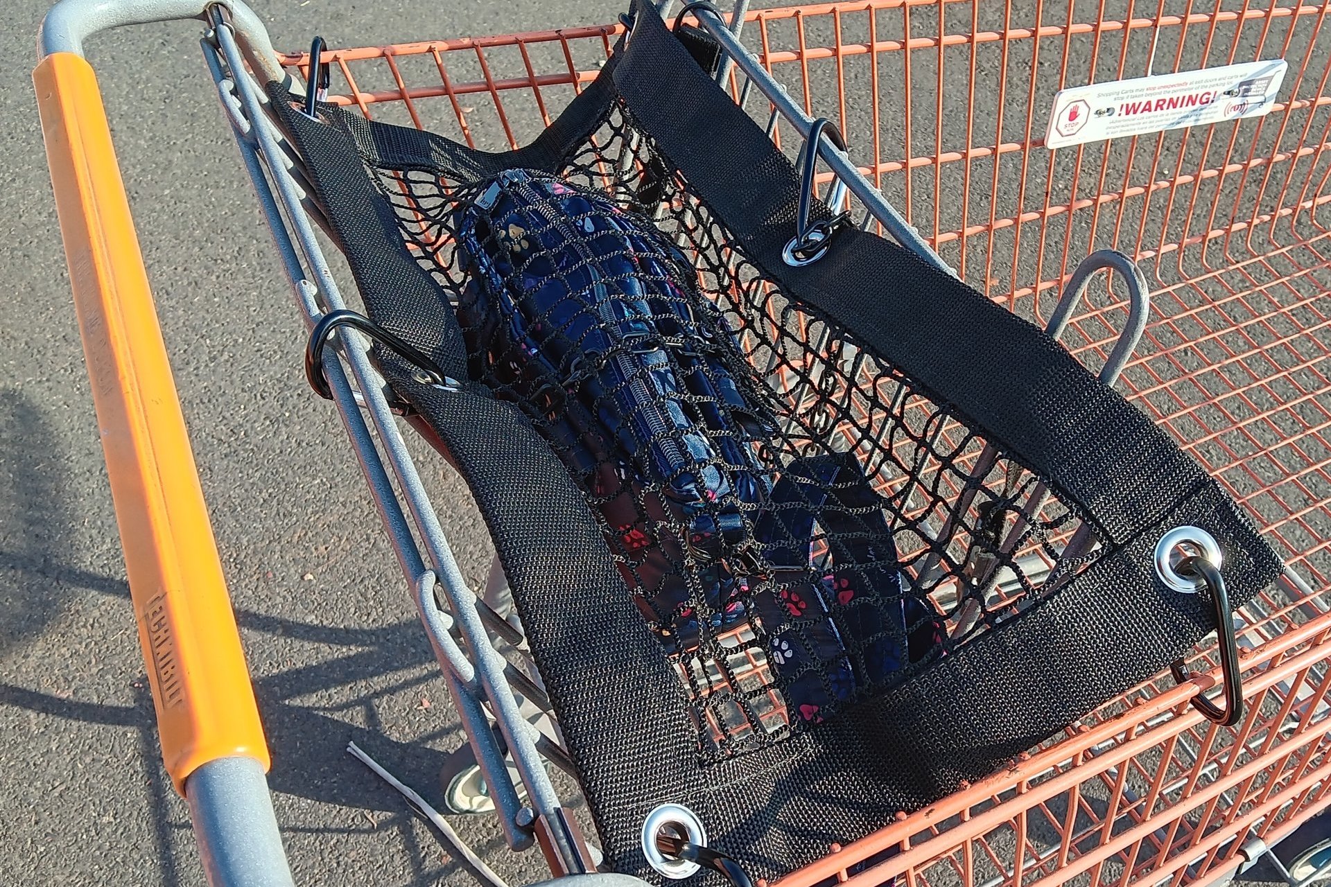 Purse and Handbag Theft Deterrent For People Who Like to Put Their Bags and Purses in Their Shopping Cart