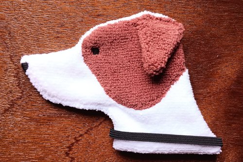 Soft, microfiber terry cloth towels cut, sewn, and made in the shape of a dog