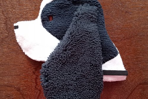 Soft, microfiber terry cloth towels cut, sewn, and made in the shape of a dog