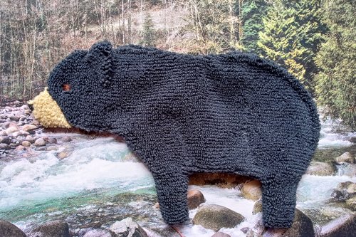 Soft, microfiber terry cloth towels  made in the shape of a Black Bear.