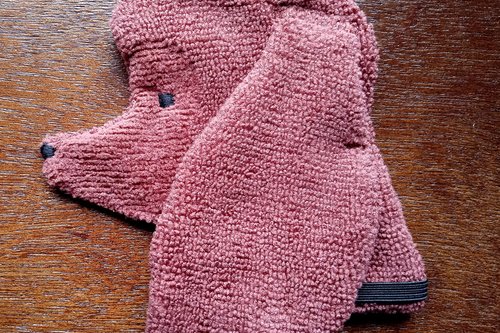 Soft, microfiber terry cloth towels cut, sewn, and made in the shape of a dog