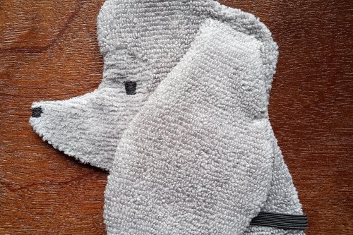 Soft, microfiber terry cloth towels cut, sewn, and made in the shape of a dog