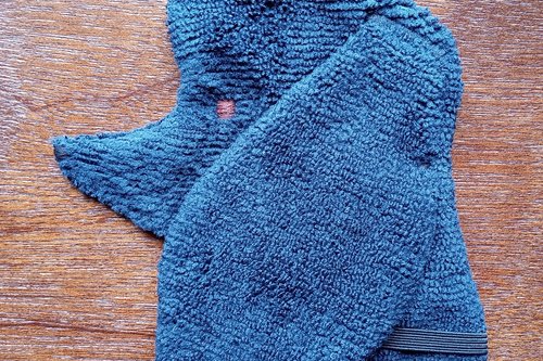 Soft, microfiber terry cloth towels cut, sewn, and made in the shape of a dog