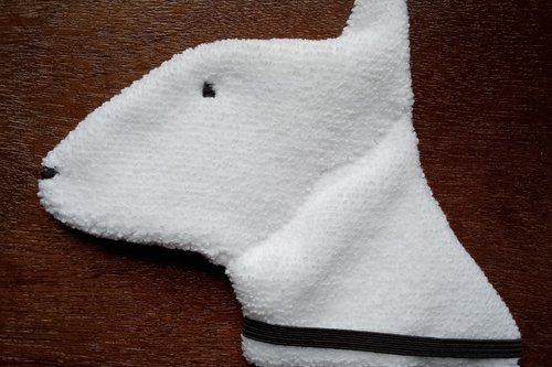 Soft, microfiber terry cloth towels cut, sewn, and made in the shape of a dog