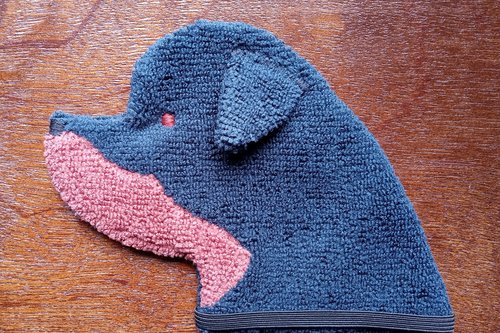 Soft, microfiber terry cloth towels cut, sewn, and made in the shape of a dog