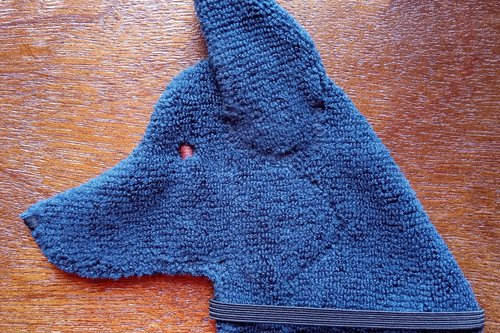 Soft, microfiber terry cloth towels cut, sewn, and made in the shape of a dog