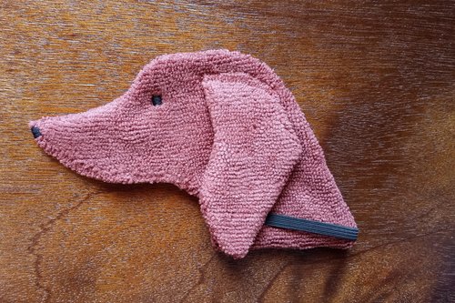 Soft, microfiber terry cloth towels cut, sewn, and made in the shape of a dog